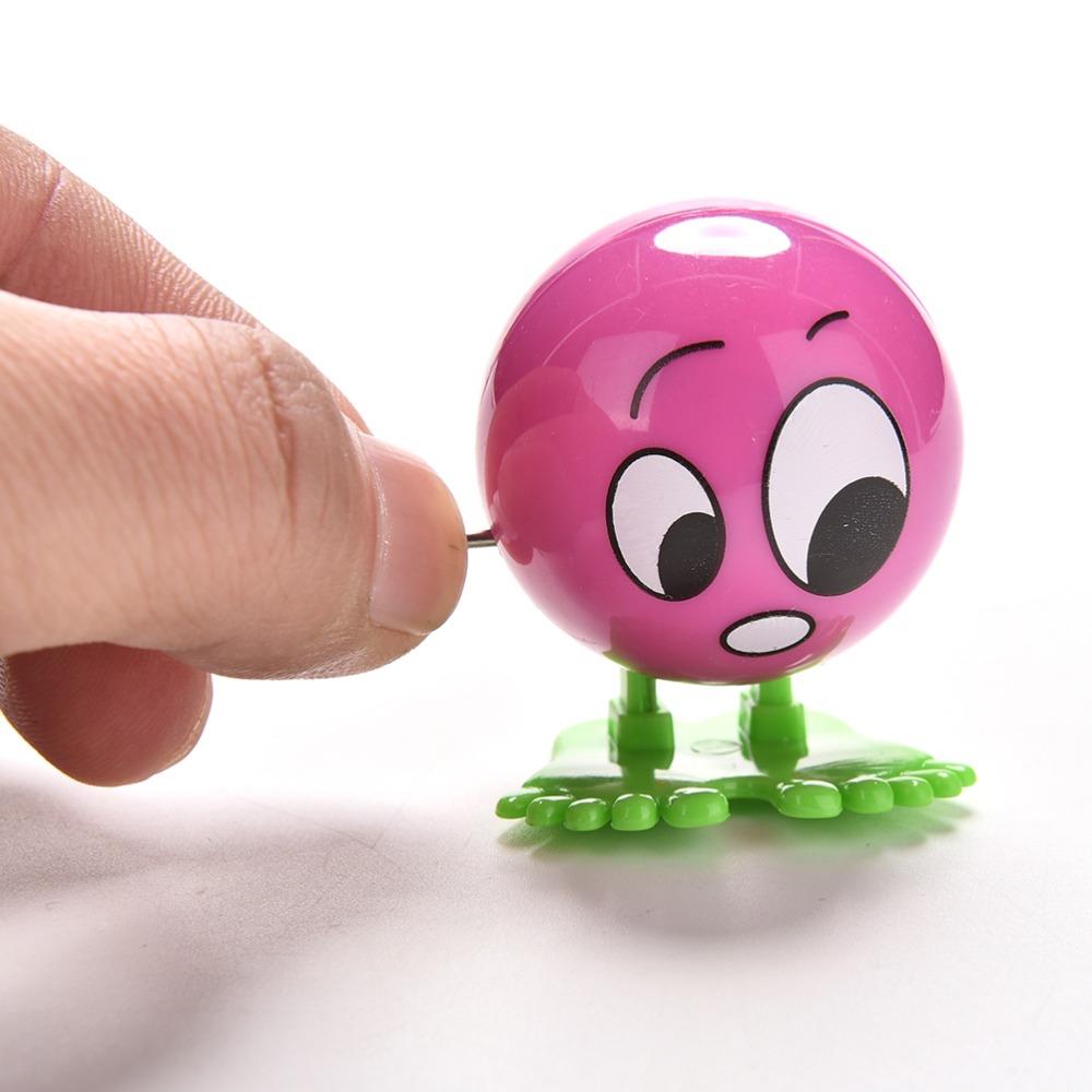 Изображение товара: 1 шт. милые красочные Смешные кувырки для лица, ходовые заводные игрушки, экологически чистые материалы, весенние детские игрушки