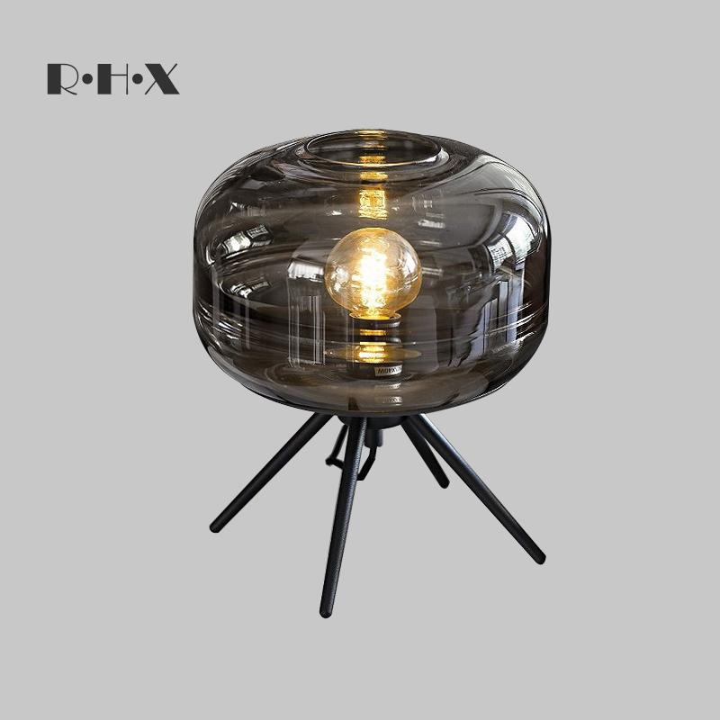 Изображение товара: Ветровая Настольная лампа с оригинальным современным лаконичным дизайном, индивидуальная стеклянная лампа для гостиной, прикроватный шкаф, настольная лампа