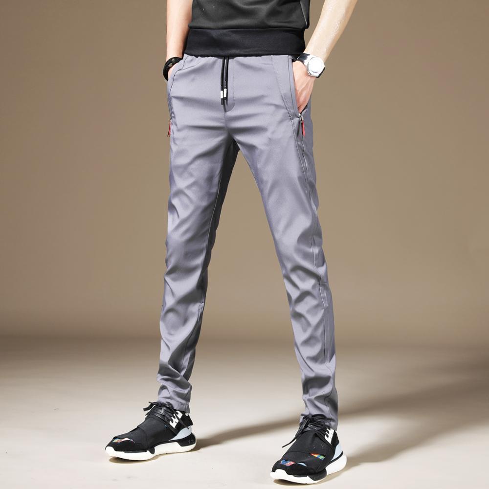 Изображение товара: Черные повседневные штаны для бега, мужские летние легкие модные облегающие спортивные брюки с эластичной талией и шнурком