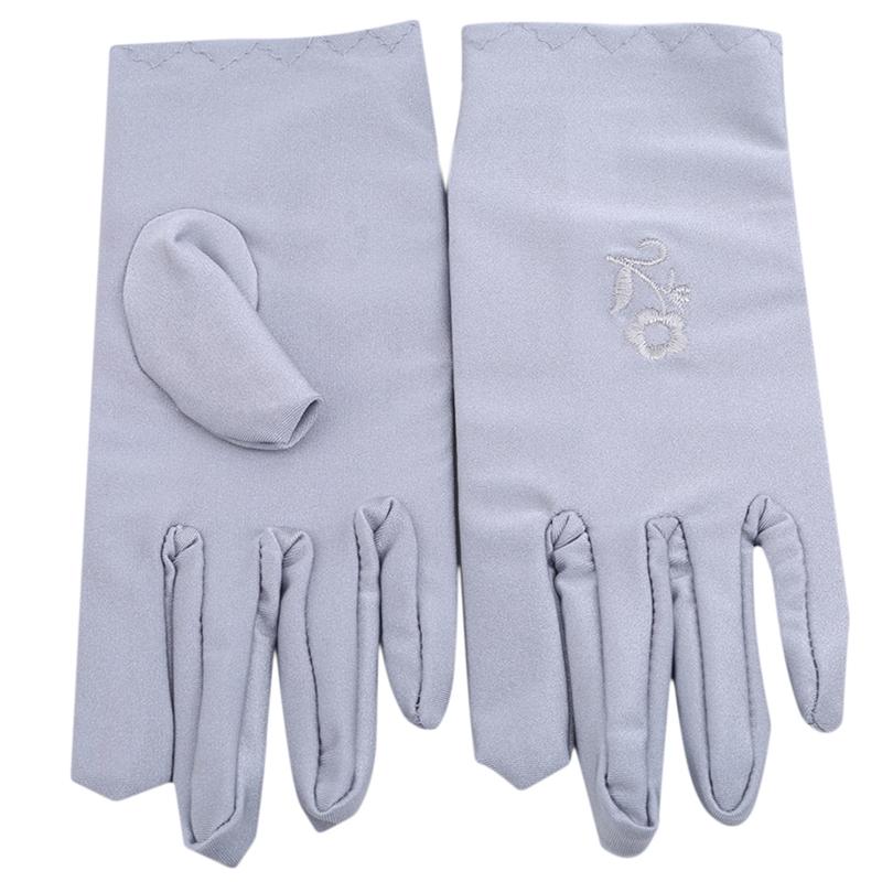Изображение товара: Женские солнцезащитные перчатки, модные женские короткие солнцезащитные перчатки с вышивкой для ухода за кожей, эластичные тонкие перчатки на весну и осень