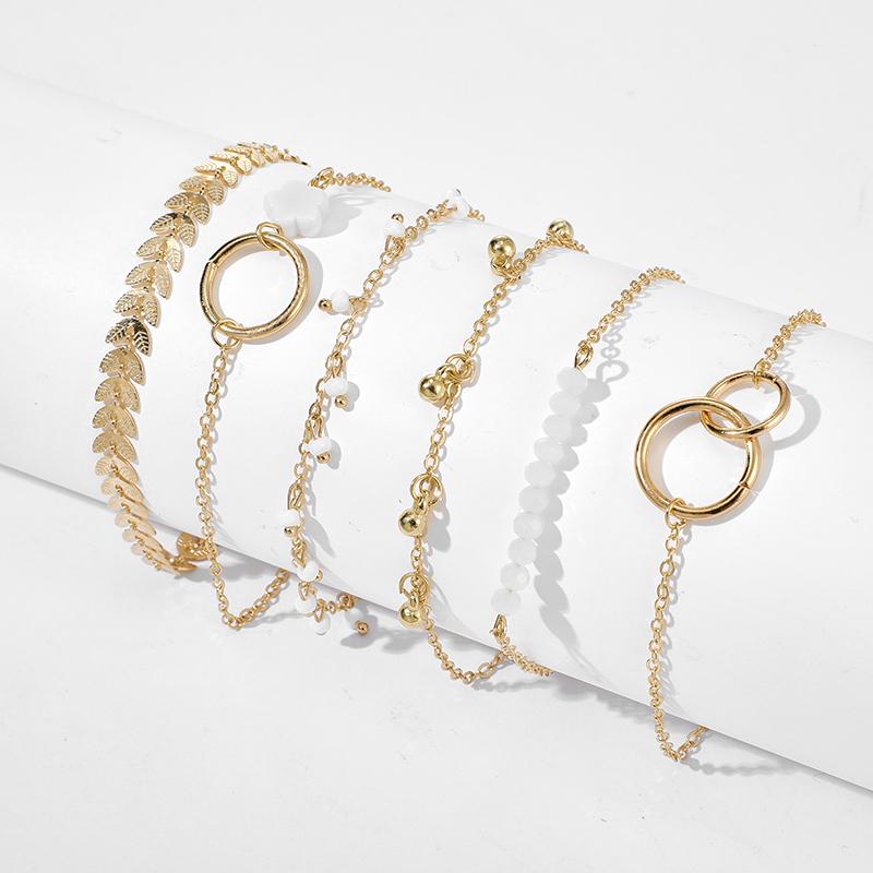 Изображение товара: Набор браслетов и цепочек для женщин, фианинское богемное Золото Браслеты с кисточкой пробы, украшения в стиле бохо, с геометрическими листьями и бусинами
