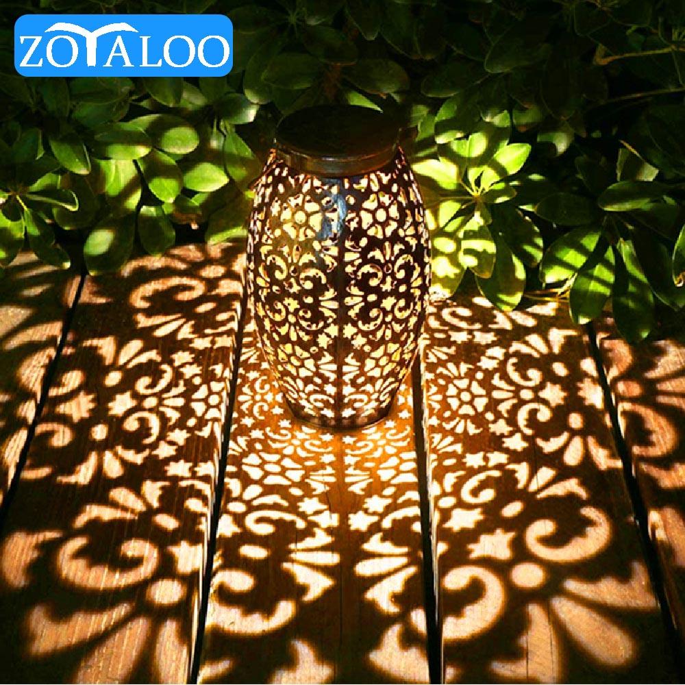 Изображение товара: Светодиодный Ретро садовый светильник Zoyaloo на солнечной батарее, металлическая ажурная лампа с проекцией тени, уличное освещение, водонепроницаемый ландшафтный светильник