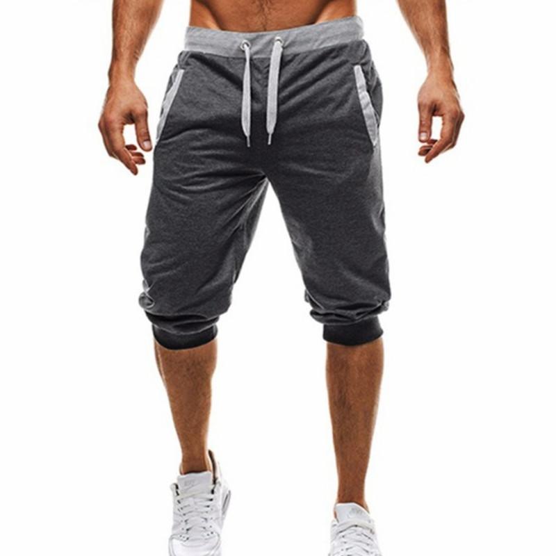 Изображение товара: Новинка 2021, модные мужские повседневные спортивные брюки, облегающие цветные подходящие брюки для фитнеса и бега, уличная одежда в стиле хип-хоп, штаны для бега CG006