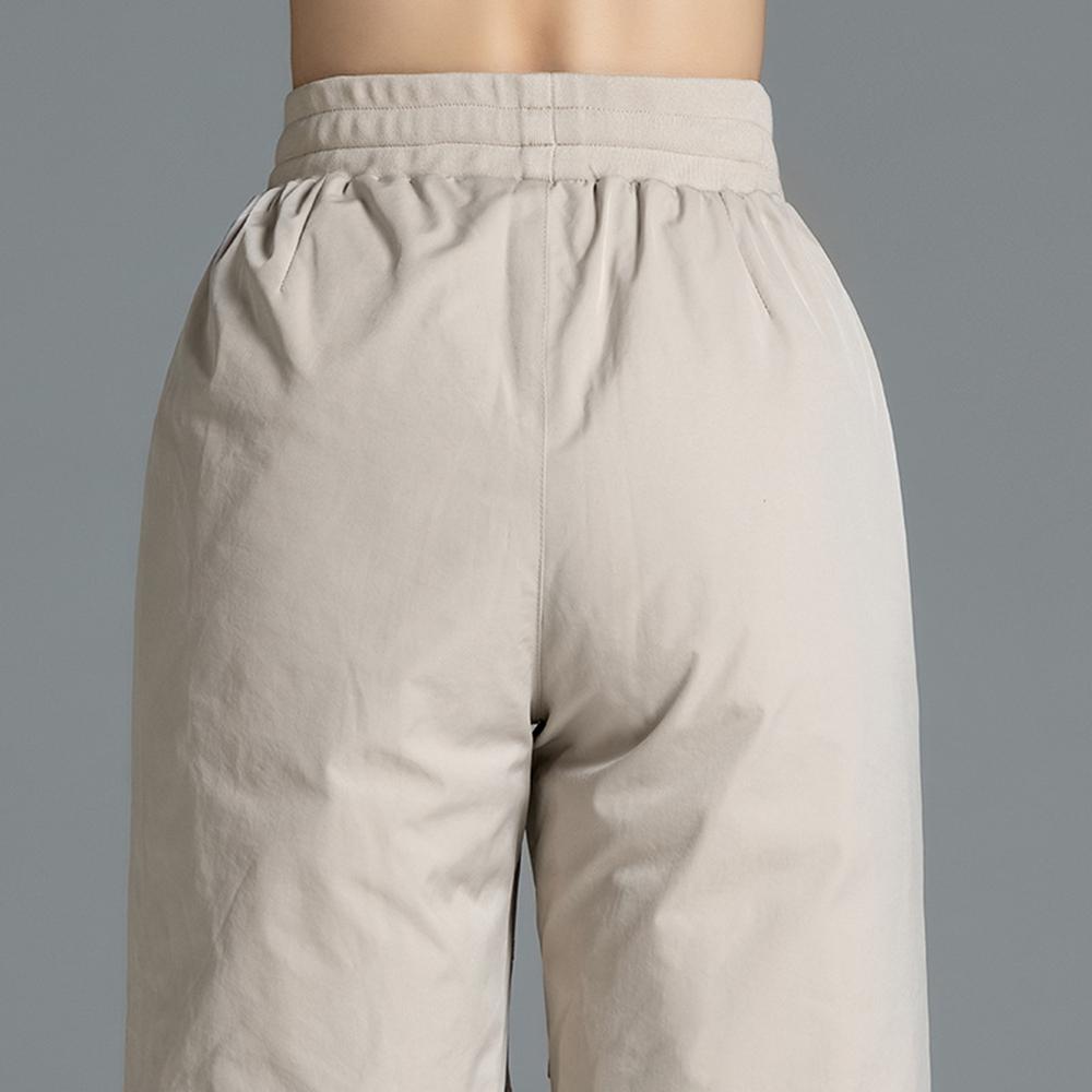 Изображение товара: Женские пуховые брюки с эластичной резинкой на талии, с хлопковой подкладкой, утолщенные, для похудения, большие размеры, зимние ветрозащитные Брюки для ног, зимняя одежда