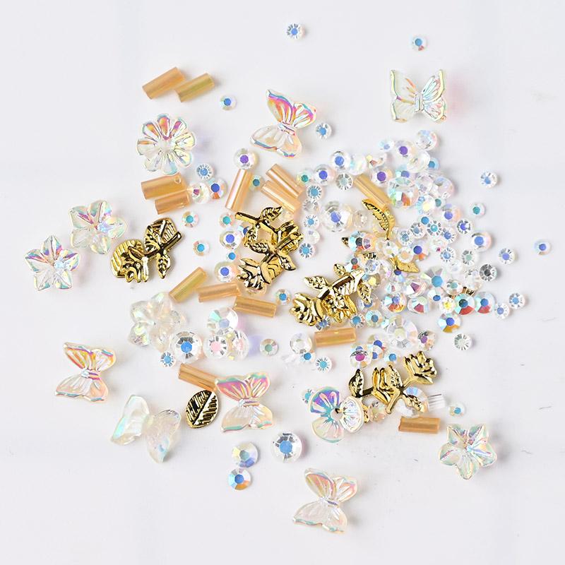Изображение товара: Стразы для ногтей, 1 коробка, разные узоры, бабочки, украшения для ногтей, стразы из сплава декоративная раковина, Цветочные бусины для украшения ногтей # JS01 #