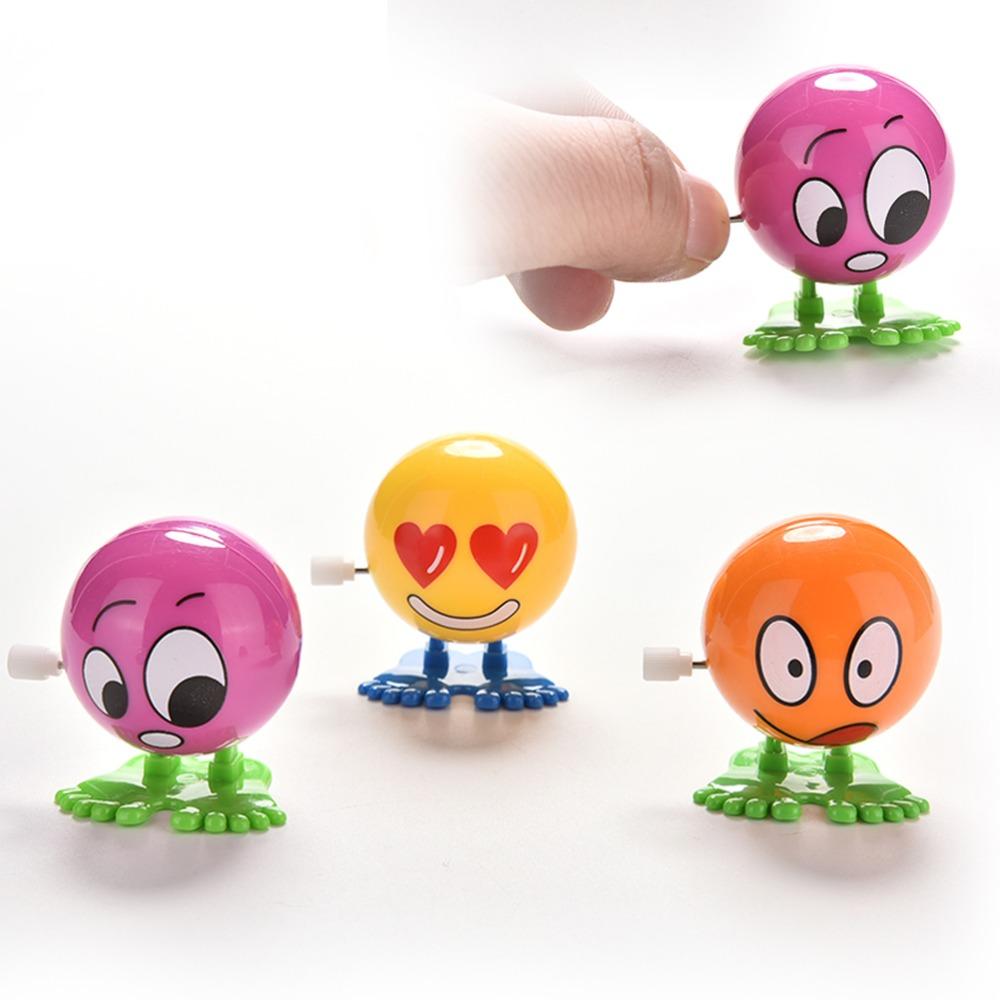 Изображение товара: 1 шт. милые красочные Смешные кувырки для лица, ходовые заводные игрушки, экологически чистые материалы, весенние детские игрушки