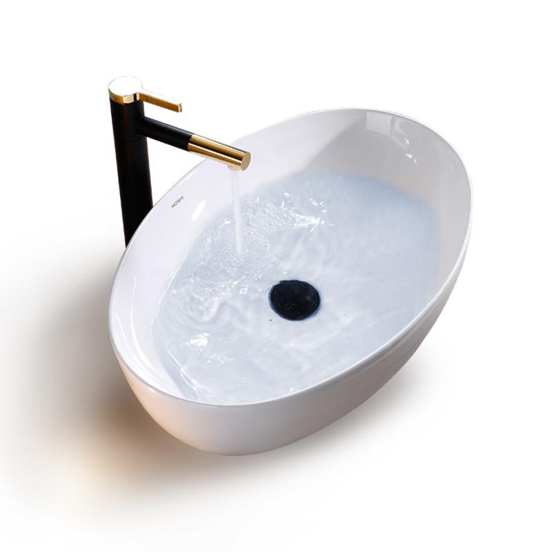 Изображение товара: Bathroom Sink Ceramic White ovale  Wash Basin Countertop Sinks Drainer Nordic Ceramic Washbasin Art Basin Shampoo Bowl