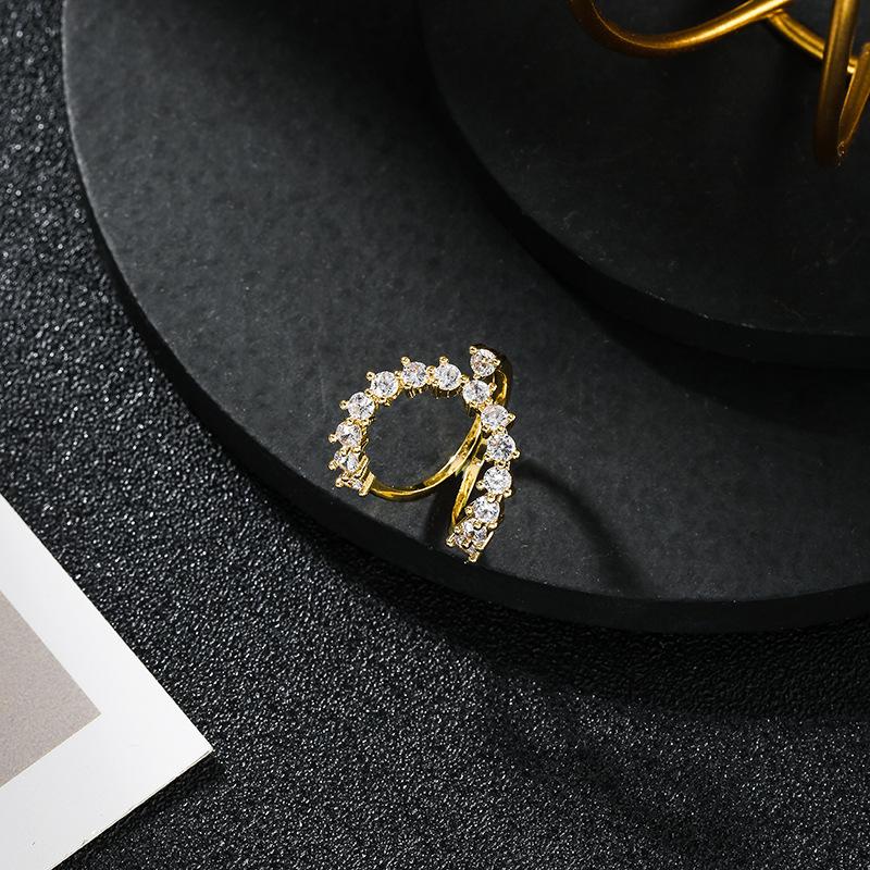 Изображение товара: Роскошное Брендовое дизайнерское Золотое кольцо для женщин, специальные нестандартные геометрические циркониевые кольца для девочек, модные ювелирные изделия, подарки Вечерние