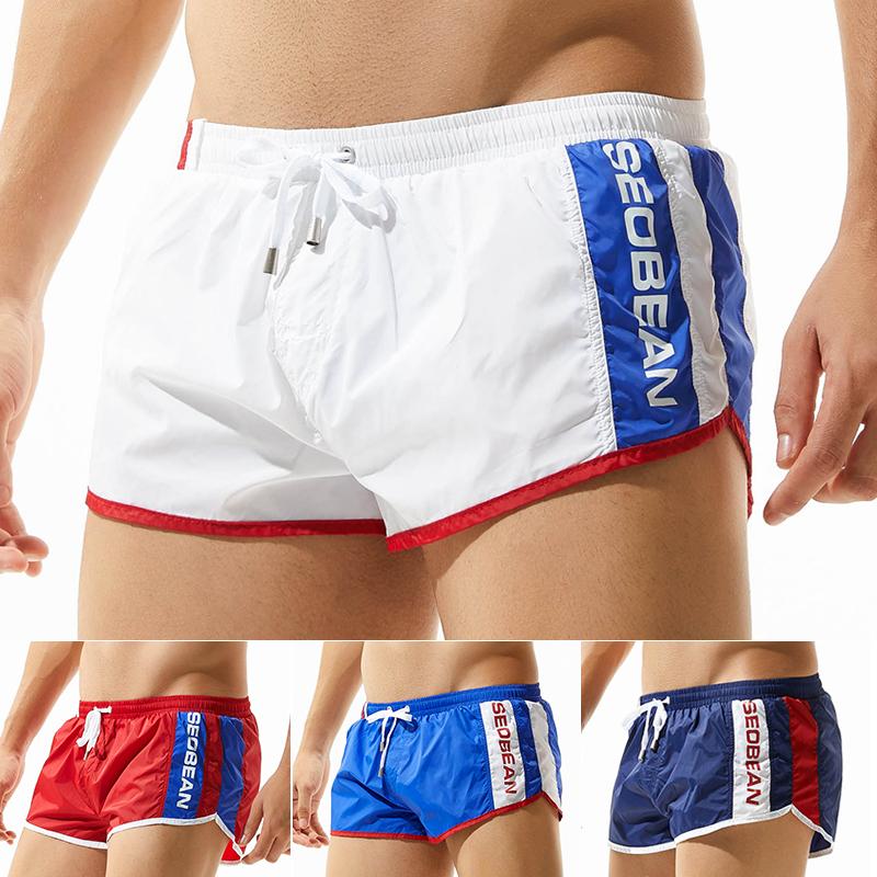 Изображение товара: Новые спортивные мужские шорты для бега, быстросохнущие сетчатые шорты для тренировок в тренажерном зале, мужские шорты для футбола, тенниса, пляжа, плавания