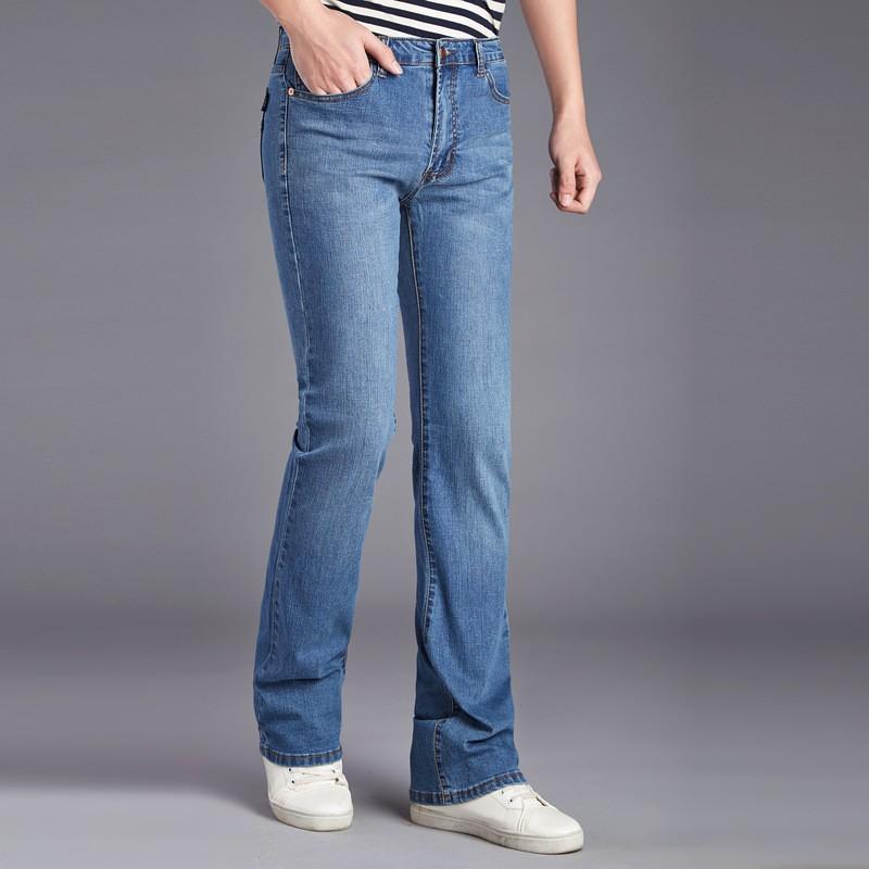 Изображение товара: Осенние мужские длинные джинсы, Облегающие расклешенные брюки, эластичные рабочие джинсовые брюки-карго, 55 дюймов, ковбойские брюки с внутренней юбкой