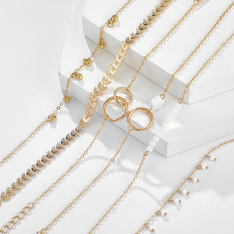Изображение товара: Набор браслетов и цепочек для женщин, фианинское богемное Золото Браслеты с кисточкой пробы, украшения в стиле бохо, с геометрическими листьями и бусинами