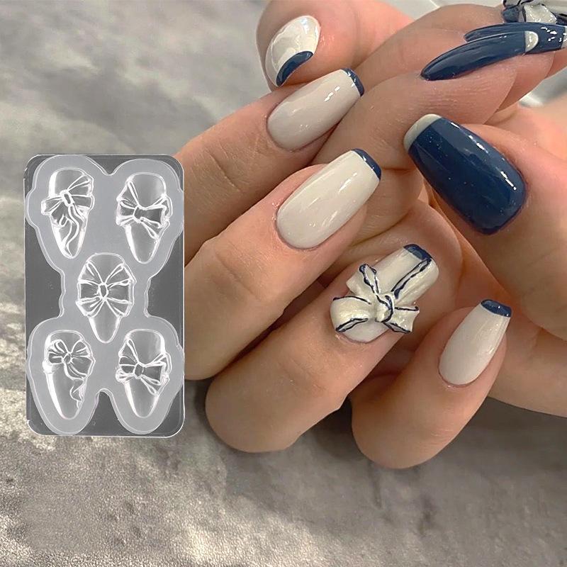 Изображение товара: Силиконовая форма для вырезания ногтей штамп трафареты 3D бабочка лук кристалл пластина маникюрный пресс DIY Инструменты Шаблон для дизайна ногтей Гель-лак