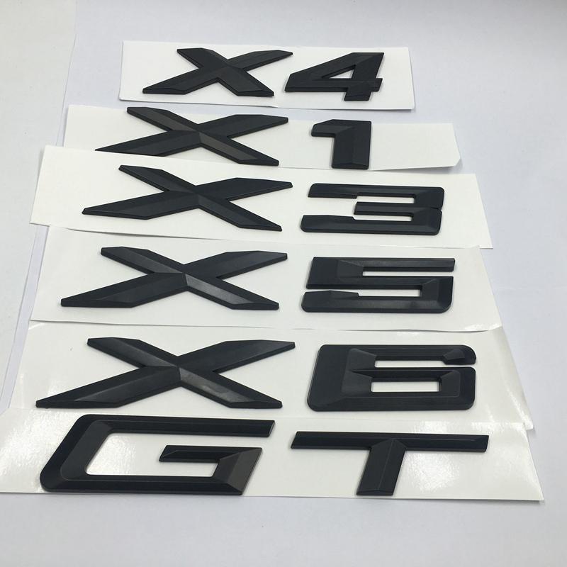 Изображение товара: Автомобильные наклейки матовые черные для BMW X1, X3, X4, X5, X6 GT, буква с цифрами, значок, эмблема, наклейка, логотип на задний багажник автомобиля, наклейки для BMW серии X