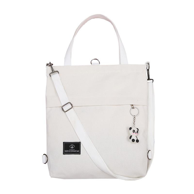 Изображение товара: Холщовая Сумка-тоут для женщин, Повседневная сумка на плечо, складная сумка для покупок, пляжная сумка, женская сумка из хлопчатобумажной ткани с подвеской панды