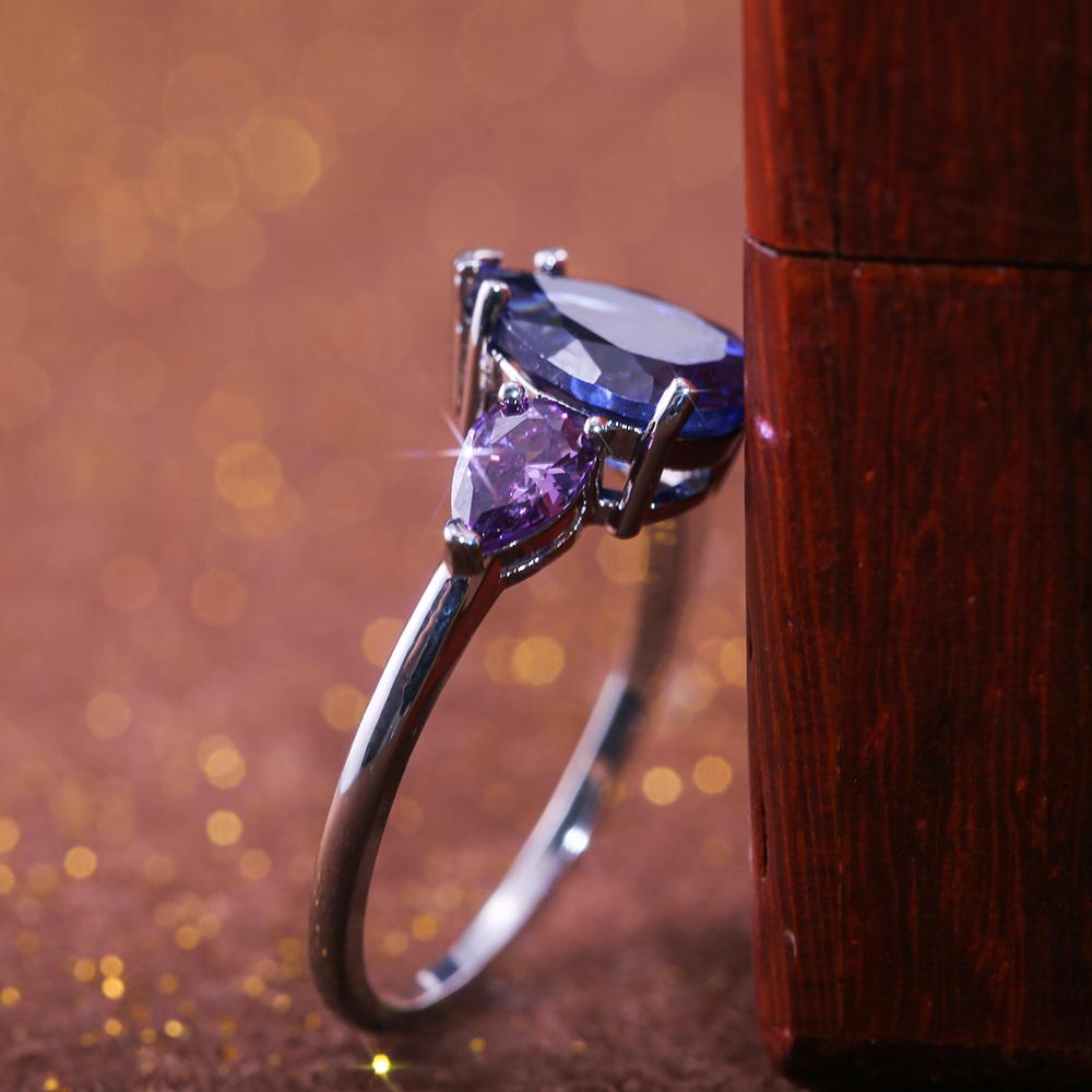 Изображение товара: Обручальные кольца Huitan в форме капли воды с синим и фиолетовым тройным блестящим кубическим цирконием, роскошные женские вечерние ювелирные украшения на палец