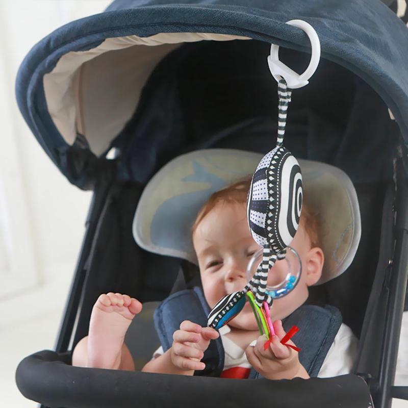 Изображение товара: Мультяшный аксессуар для детской коляски, подвесные плюшевые игрушки для детей, зеркало безопасности, кольцо, бумажный детский Прорезыватель