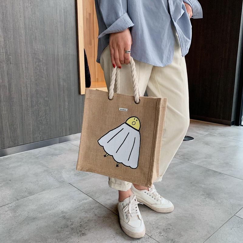 Изображение товара: Женская сумка из джута Uupperway, летняя сумка из ротанга в Корейском стиле, сумка с ручкой из веревки для девушек, сумка для студентов колледжа, пляжная сумка-тоут с мультяшным принтом