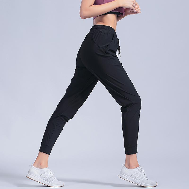 Изображение товара: Женские спортивные брюки, нейлоновые быстросохнущие штаны для бега, Повседневные Дышащие Джоггеры для йоги на шнурке с карманами, женские спортивные штаны