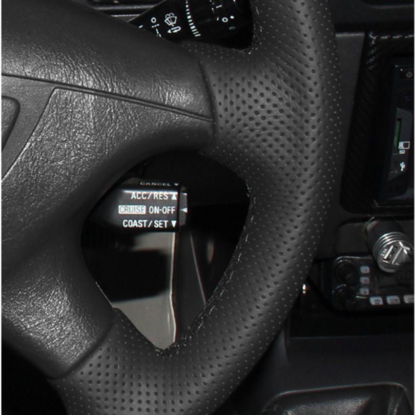 Изображение товара: Чехол для руля Mitsubishi Pajero Sport 2004 Montero Sport 2004, черная искусственная кожа, сшитая вручную