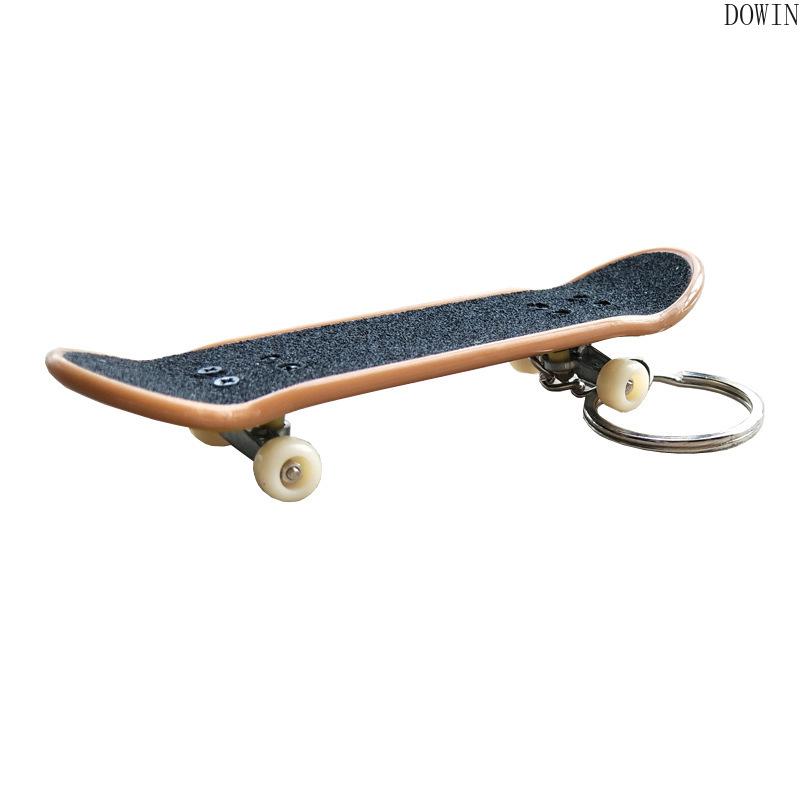 Изображение товара: Креативный мини Пальчиковый скейтборд гриф сплав стенты скраб скутер для пальца кататься с цепочкой для ключей, игрушки для детей