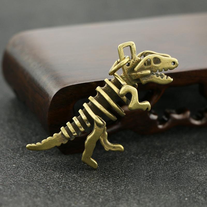 Изображение товара: Латунные брелоки ручной работы в виде модели скелета динозавра, медные брелоки в стиле ретро для автомобиля, подвески, изящные креативные подвесные сумки, детские подарки
