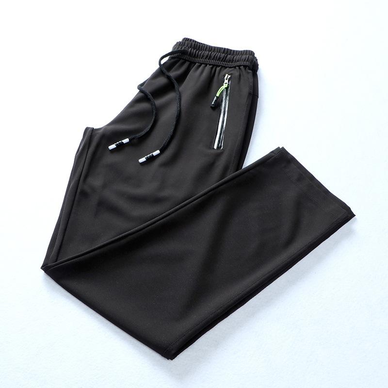 Изображение товара: Летние мужские шелковые брюки , тонкие дышащие свободные растягивающиеся брюки большого размера , быстросохнущие повседневные спортивные брюки для фитнеса