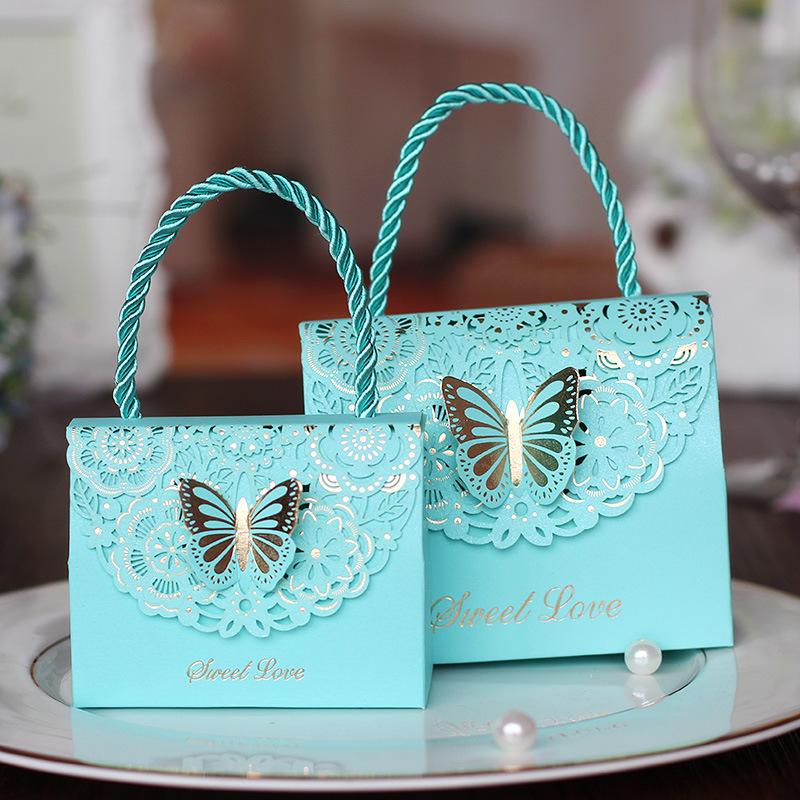 Изображение товара: 50 шт./лот, Свадебная коробка для конфет, креативная, резная, складная, Бабочка, Свадебная подарочная коробка, китайская Свадебная, изысканная коробка для конфет