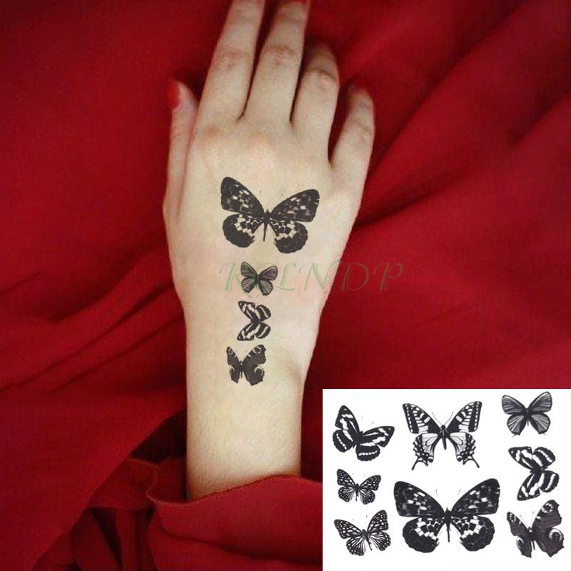 Изображение товара: Водостойкая Временная тату-Наклейка Черная бабочка маленькая художественная поддельная тату флэш-тату на запястье ножная шея для мужчин и женщин