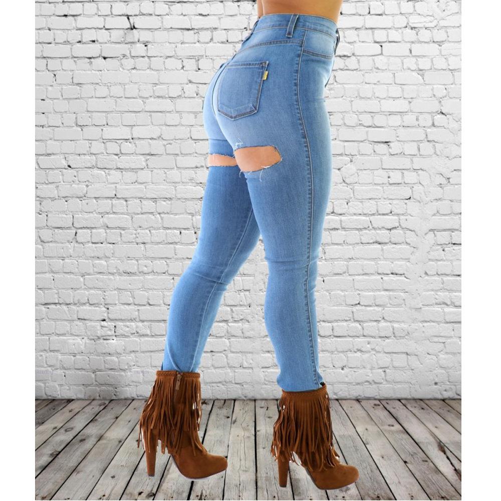 Изображение товара: Женские рваные джинсы высокого качества, облегающие однотонные брюки-карандаш с завышенной талией и украшением из дыр, новые рваные брюки на осень 2020