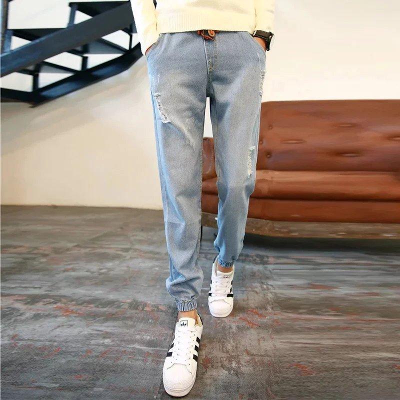 Изображение товара: Оптовая продажа 2022 мужские рваные джинсы для подростков Модные Узкие Свободные повседневные шаровары в стиле хип-хоп в Корейском стиле