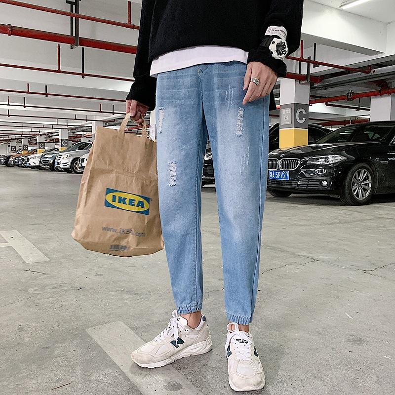 Изображение товара: Весна Лето 2022 Новинка укороченные брюки мужские модные европейские американские рваные однотонные джинсы прямые брюки-султанки для подростков