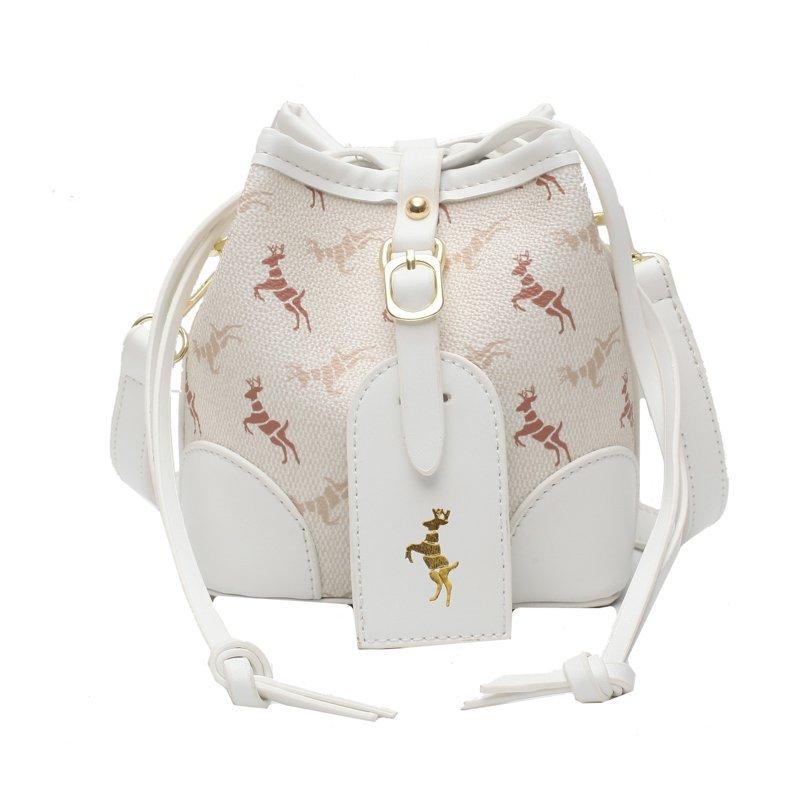 Изображение товара: Женская сумка, новинка 2020, модная сумка через плечо, Корейская версия универсальной сумки-ведра, Супер Популярные сумки через плечо с принтом в Instagram