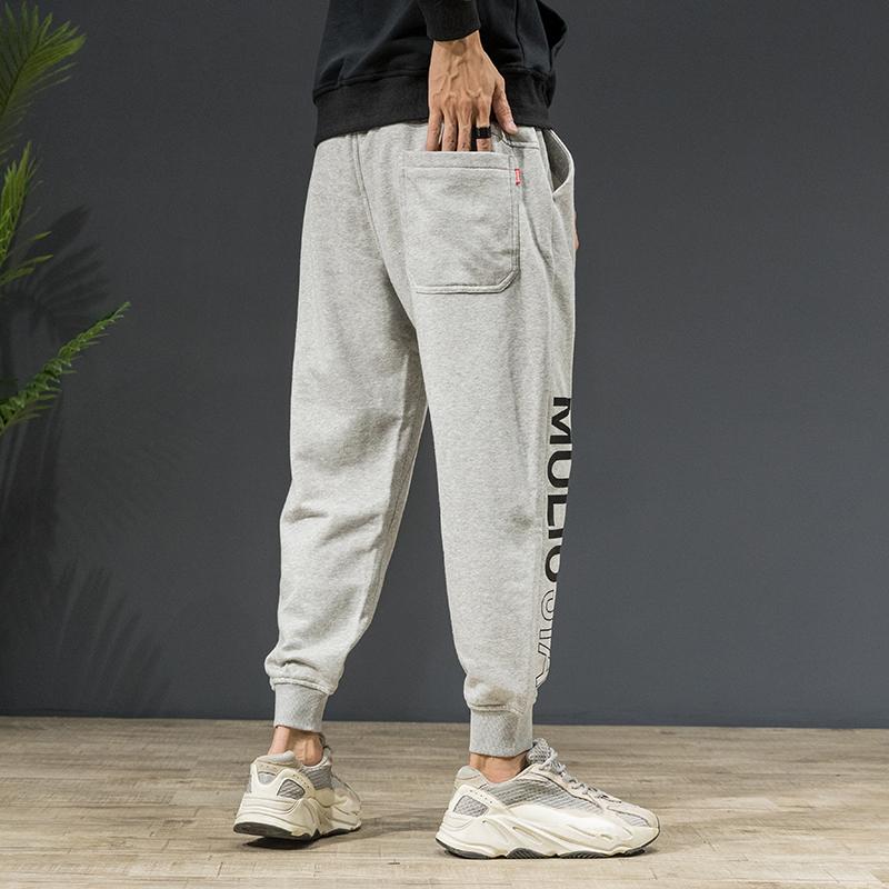 Изображение товара: Брендовые новые мужские брюки, модные трикотажные брюки с буквенным принтом, высокое качество, Ropa Spodnie, свободные повседневные штаны, размер S-3XL