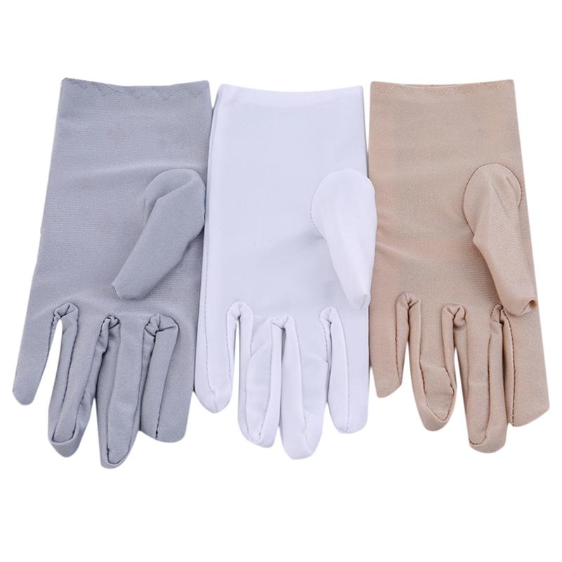 Изображение товара: Женские солнцезащитные перчатки, модные женские короткие солнцезащитные перчатки с вышивкой для ухода за кожей, эластичные тонкие перчатки на весну и осень