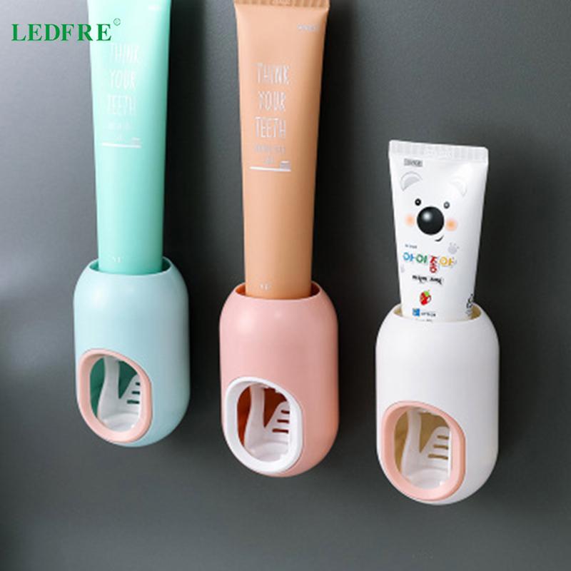 Изображение товара: Настенный диспенсер для зубной пасты LEDFRE, автоматическая выдавливаемая пластиковая стойка для зубных щеток для ванной комнаты lf71033