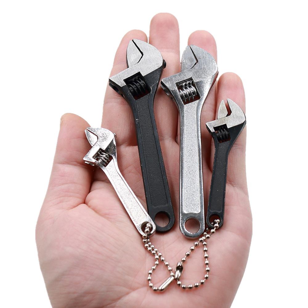 Изображение товара: Многофункциональный мини-гаечный ключ, портативный ручной инструмент для быстрого ремонта металла, высокопрочный с цепочкой Универсальный Регулируемый ключ